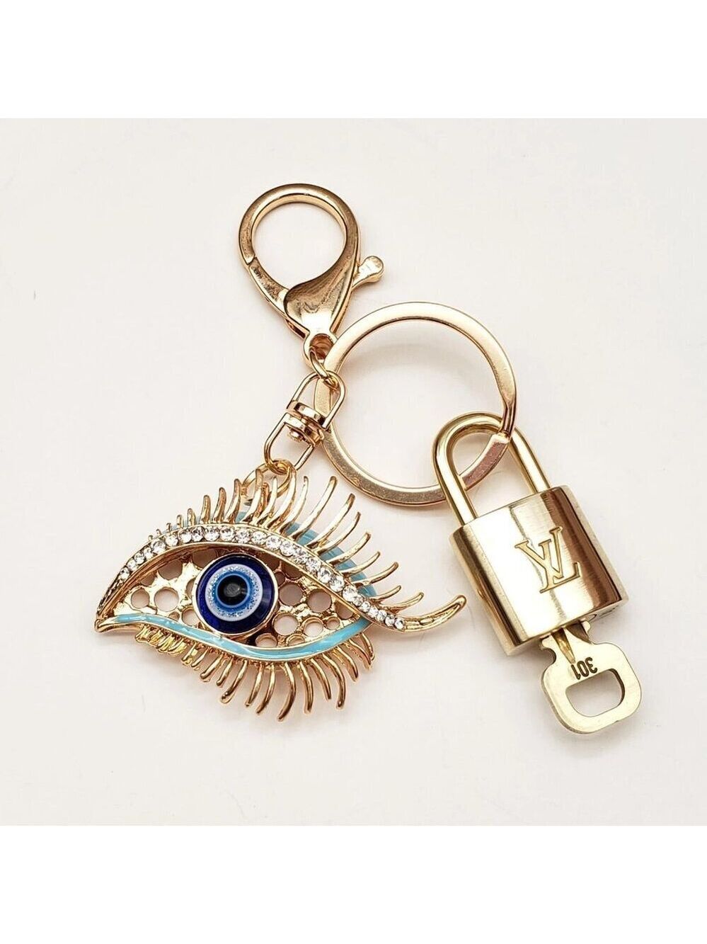 Authentic Louis Vuitton Lock & Key with unbranded Eye Bagcharm, Keycharm